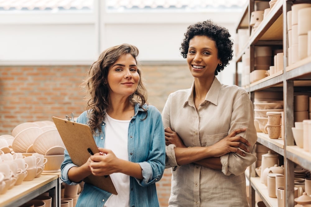 Two women standing in craft store