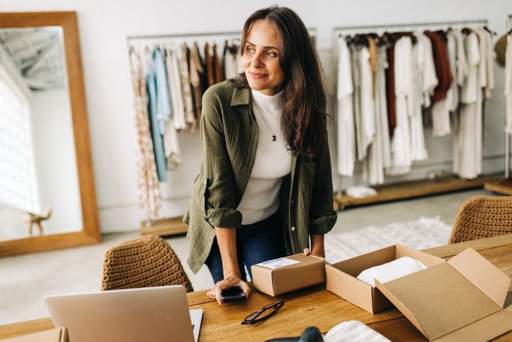 Woman boutique store owner